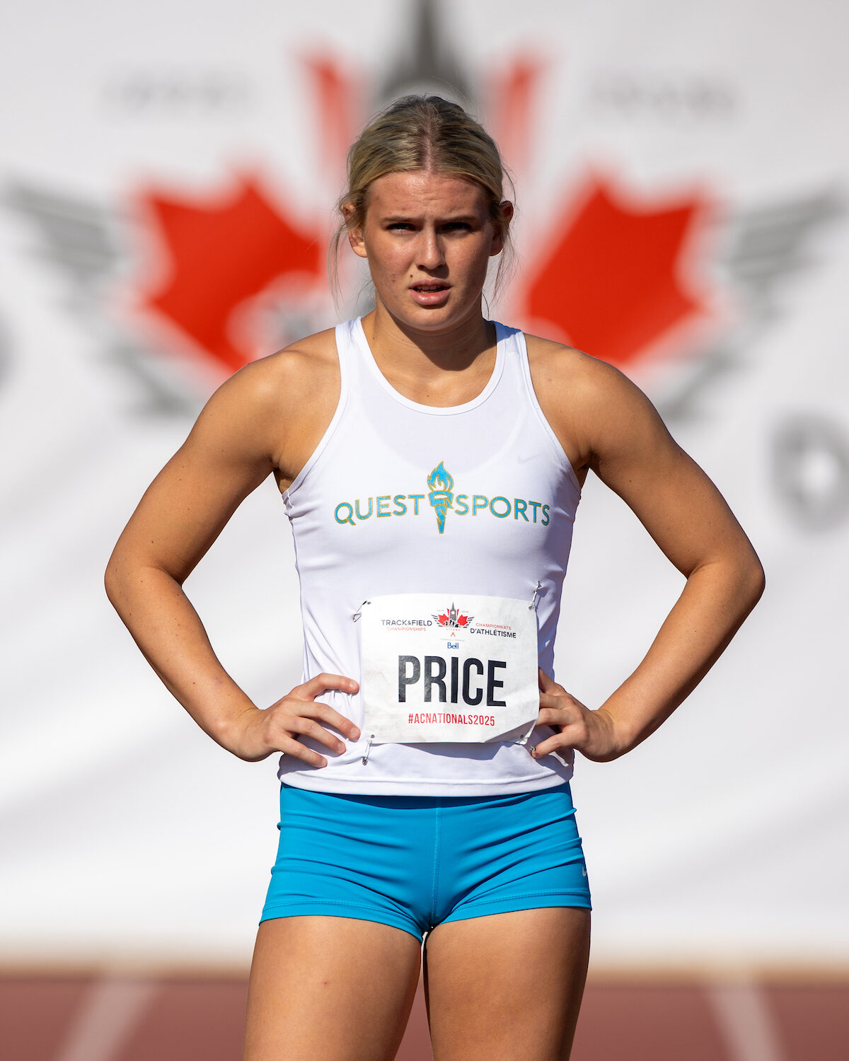 Quest Sports athlete in white singlet at the Athletics Canada National Championships